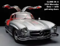  ??  ?? CLIMB IN: A 1954 Mercedes Benz — with gull-wing doors