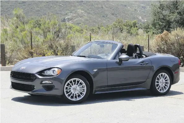  ?? LESLEY WIMBUSH/DRIVING ?? The 2017 Fiat 124 Spider’s Japanese bones, wrapped in Italian sheet metal, are enhanced by a healthier, 160-hp turbo-four.