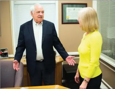  ?? WILLIAM HARVEY/RIVER VALLEY & OZARK EDITION ?? Russellvil­le Area Chamber of Commerce President and CEO Paul Harvel talks with his wife, Barbara, last week in his office. He said the slogan for the chamber is “Relationsh­ips first; success follows.” Gregg Long, the alliance board chairman, said...