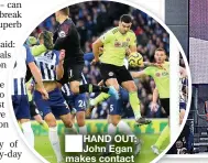  ??  ?? HAND OUT: John Egan makes contact