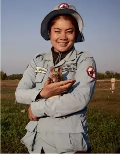  ?? ?? ABOVE: Magawa, the African giant pouched rat who was awarded the PDSA Gold Medal for his work detecting landmines, is seen here with his handler, Malen.