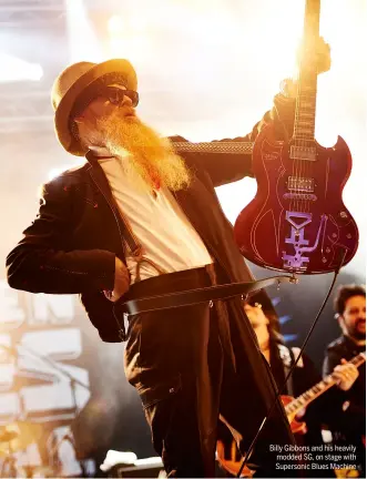  ??  ?? Billy Gibbons and his heavily modded SG, on stage with Supersonic Blues Machine