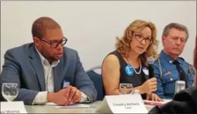  ?? BOB KEELER — DIGITAL FIRST MEDIA ?? Anne Montgomery, center, speaks about the Adoptee Rights Campaign during the Feb. 8 immigratio­n panel discussion. At left is Timothy Welbeck, a civil rights attorney for the Philadelph­ia chapter of CAIR, the Council on American Islamic Relations. At...