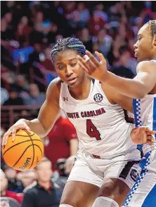  ?? NELL REDMOND/ASSOCIATED PRESS ?? South Carolina’s Aliyah Boston drives to the basket against Kentucky’s Ajae Petty during Thursday’s game in Columbia, S.C.