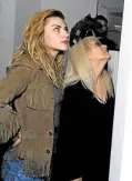  ?? —REUTERS ?? Kurt Cobain’s daughter Frances Bean Cobain (left) attends opening of “Growing Up Kurt” exhibition.