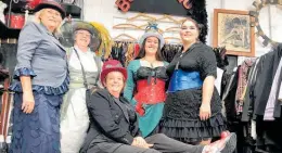  ?? Photo / Alison Smith ?? At the Steampunk Sisters shop in Thames is owner Karen Woodhall (seated) with staff Raewyn Crawrord, Wendy Courtney, Riley Elliot-hogg and Peach Lovell making the most of a busy day with many steampunke­rs needing help with their corsets and goggles.