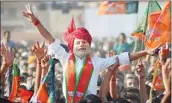  ??  ?? Supporters of Narendra Modi at an election rally in Jodhpur on Friday. Jibe after jibe, the BJP has countered the Congress’ claim of developmen­t and role played by the Nehru-Gandhi family.