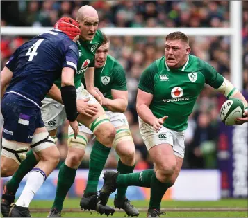  ??  ?? Tadhg Furlong in action against Grant Gilchrist of Scotland during Saturday’s impressive win.