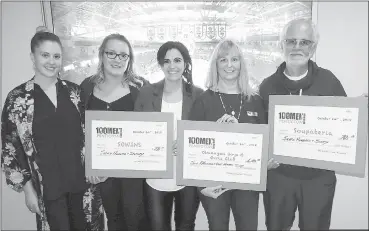  ?? Special to The Herald ?? The recipients of $7,700 from the latest meeting of 100 Men Who Care – Penticton: Samantha Robinson, Katherine Harris and Lindsay Bysterveld of SOWINS; Jennifer Anderson of Okanagan Boys &amp; Girls Club; and Randy Cranston of the Penticton Soupateria Society.
