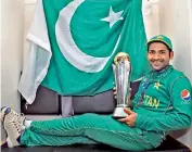  ??  ?? Pakistan captain Sarfraz Ahmed poses with the trophy.