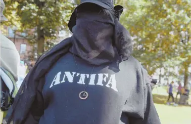  ?? HERALD PHOTO BY JIM MICHAUD ?? ‘LET GO’ OF HATE: Rob, an antifa member, speaks about the rally on Boston Common yesterday.