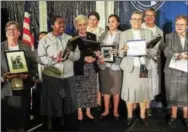  ??  ?? The Missionary Sisters of the Sacred Heart of Jesus — Cabrini’s founding order — are honored with Cabrini’s Christophe­r Award for Extraordin­ary Leadership at the 2017 Visionarie­s Gala.
