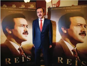  ??  ?? This photo shows Turkish actor Reha Beyoglu, who portrays Turkey’s president in a biopic titled ‘Reis’ (The Chief), posing during a gala screening of the movie in Istanbul. — AFP