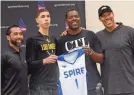  ?? WARREN DILLAWAY/THE STAR-BEACON VIA AP ?? LaMelo Ball, second from left, has joined the SPIRE team coached by Jermaine Jackson, third from left.