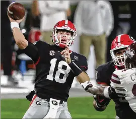  ?? CURTIS COMPTON/ AJC 2020 ?? The only area in which Georgia might experiment would be on offense, where it’s aiming for a more explosive passing game with quarterbac­k JT Daniels.