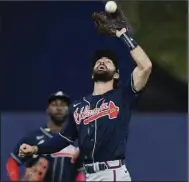  ?? (AP/Wilfredo Lee) ?? Atlanta shortstop Dansby Swanson said, “experience in the playoffs is huge” as the Braves get set to take on the Philadelph­ia Phillies in a National League division series. The Braves earned their first World Series title in 26 years last season.