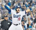  ??  ?? Winning feeling: Max Muncy celebrates victory after seven hours and 21 minutes
