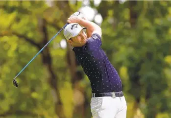  ?? STEVE DIPAOLA AP ?? Branden Grace watches his tee shot on the fourth hole during the final round of the Portland Invitation­al.