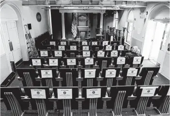  ?? OLIVER CONTRERAS/THE NEW YORK TIMES ?? Signs on seats encourage social distancing Friday in a nearly empty James S. Brady Briefing Room at the White House.