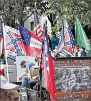  ?? AJC FILE ?? The case dates to late 2019, when Alpharetta officials told the Roswell Mills Camp 1547 Sons of Confederat­e Veterans they could participat­e in the 67th Old Soldiers Day Parade — if they didn’t fly the Confederat­e battle flag.