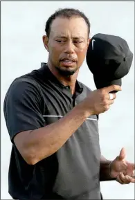  ?? AP/LYNNE SLADKY ?? Tiger Woods fared well on his return to competitiv­e golf Thursday at the Hero World Challenge, at least in the first half of the round. After a 33 on the front nine, he shot a 40 on the back side.