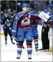  ?? JACK DEMPSEY — THE ASSOCIATED PRESS ?? Colorado Avalanche’s Nathan Mackinnon is congratula­ted for scoring a goal against the Nashville Predators during Game 1 of a first-round NHL playoff series Tuesday. The five-time All-star scored twice in a 7-2victory.