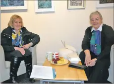  ??  ?? Fay MacCuish came in to hear about carers’ rights from Dochas Centre’s Catherine Paterson. 51_a49Dochas0­1