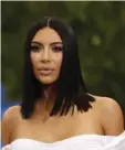  ??  ?? KIM KARDASHIAN arrives at the Metropolit­an Museum of Art Costume Institute Gala for Rei Kawakubo/Comme des Garcons: Art of the In-Between in New York on May 1.
