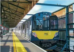  ?? James Pilbeam ?? On the reopening morning, November 1, 2021, 484004 and 484001 stand at Ryde Pier station. Services on the first day were disrupted due to signalling issued caused by a storm the previous day.