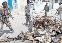  ?? FARAH ABDI WARSAMEH/THE ASSOCIATED PRESS ?? Somali forces shot three extremists wearing soldiers’ uniforms.