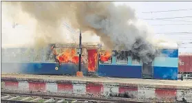  ?? SANTOSH KUMAR/HT PHOTO ?? A train set on fire at Chapra railway station on Thursday.