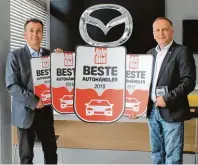  ?? Fotos: jkor, Auto Frey ?? Von der AUTO BILD bereits zum vierten Mal als „Beste Autohändle­r“ausgezeich­net: Joachim (links) und Markus Frey.