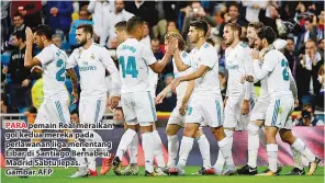  ??  ?? PARA pemain Real meraikan gol kedua mereka pada perlawanan liga menentang Eibar di Santiago Bernabeu, Madrid Sabtu lepas. — Gambar AFP