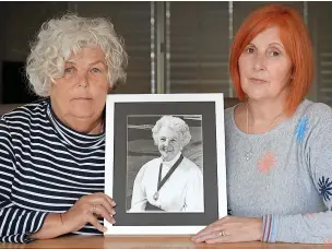  ?? ?? ●● Susan Coates and Ann Cooney with a picture of mother Hilda England