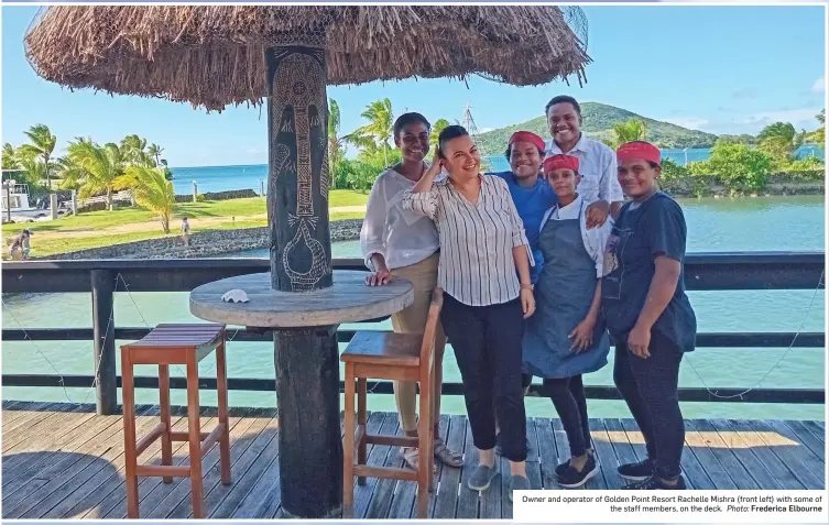  ?? Frederica Elbourne ?? Owner and operator of Golden Point Resort Rachelle Mishra (front left) with some of the staff members, on the deck. Photo:
