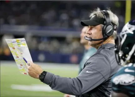  ?? MICHAEL AINSWORTH — THE ASSOCIATED PRESS ?? Eagles head coach Doug Pederson looks on from the sideline during his team’s second-half uprising Sunday night in Arlington, Texas.