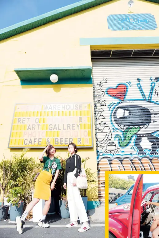  ??  ?? Fiona Li (left) and Shirlene Gu pose in front of a renovated warehouse which is now the One Hundred Million Retro Warehouse store.