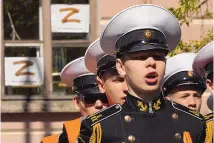  ?? DMITRI LOVETSKY/ASSOCIATED PRESS ?? Navy school cadets attend celebratio­ns for the 318th anniversar­y of the city of Kronstadt outside St. Petersburg, Russia, on May 21, with sheets depicting the letter Z, a symbol of the Russian military.