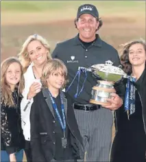  ??  ?? n Phil Mickelson and his family celebrate his victory at Castle Stuart last year. A week later they were congratula­ting him on winning The Open at Muirfield.