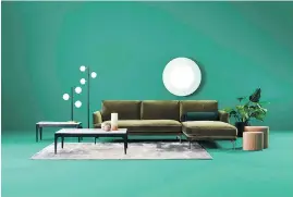  ?? MOBILIA ?? The Narnia sectional in emerald green offers a “festive, luxurious feel.”