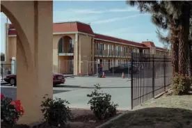  ?? Photograph: Andri Tambunan/The Guardian ?? The exterior of Ambassador Inn and Suites that has been converted into temporary shelters by the City of Fresno.