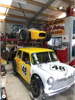  ?? ?? 4. The ex-Gary Mortimer lightweigh­t Mini with the Mallock on the hoist, all part of Denis’ racing stable.