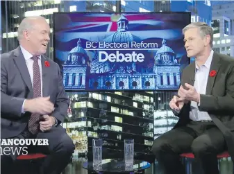  ??  ?? Premier John Horgan, left, and B.C. Liberal Leader Andrew Wilkinson debate the referendum on electoral reform.