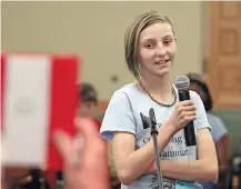  ??  ?? Raven Callaway-Kidd, a sixth-grader at Turquoise Trail Charter Elementary School, misspells ‘spinneret’ Friday in the final round of the Santa Fe County Spelling Bee at Santa Fe Community College. Callaway-Kidd took second place in the bee and will...