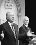  ?? JIM YOUNG/ CANADIAN PRESS ?? Prime Minister Paul Martin and NDP leader Jack Layton joined forces in a misguided effort that will hurt employees and employers.