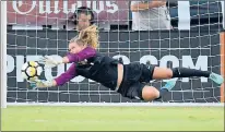  ?? MARK J. TERRILL/AP ?? U.S. goalkeeper Alyssa Naeher stops a shot. Naeher, a native of Connecticu­t, is going to start for the U.S. national team in the 2019 Women’s World Cup this week.