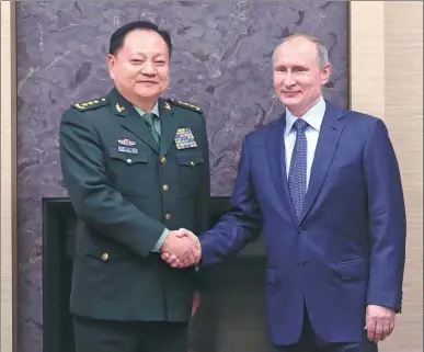  ?? LI XIAOWEI / XINHUA ?? Russian President Vladimir Putin meets with Zhang Youxia, a member of the Political Bureau of the Communist Party of China Central Committee and vice-chairman of the Central Military Commission, in Moscow on Thursday.