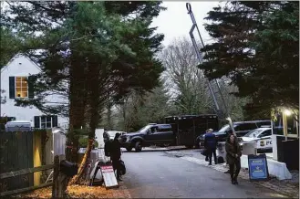  ?? Carolyn Kaster / Associated Press ?? The access road to President Joe Biden’s home in Wilmington, Del., from the media van Friday.