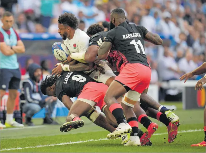  ?? Picture: AP PHOTO/FILE ?? England’s Courtney Lawes is driven into touch during the Rugby World Cup quarterfin­al match against Fiji at the Stade de Marseille in Marseille, France on Sunday, October 15, 2023. The New Zealand All Blacks will play two home Test matches against England before facing Fiji in San Diego in July.