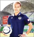  ?? AFP ?? Japanese football star Keisuke Honda poses for a photo on Wednesday after signing for Australia’s Melbourne Victory.